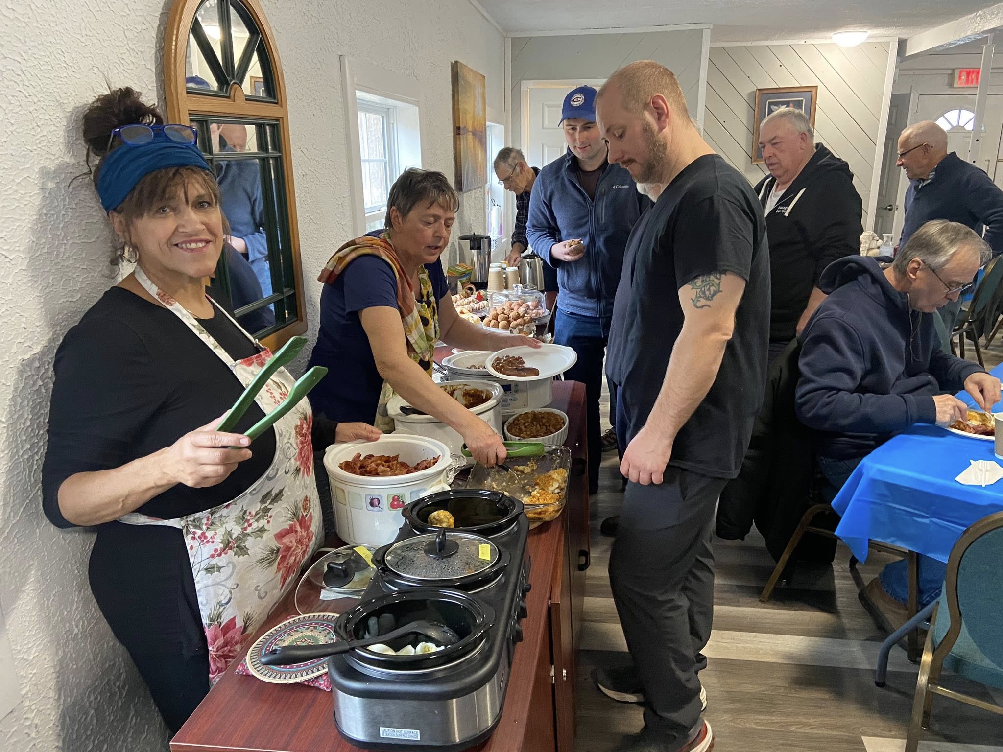 Members serving at a community event